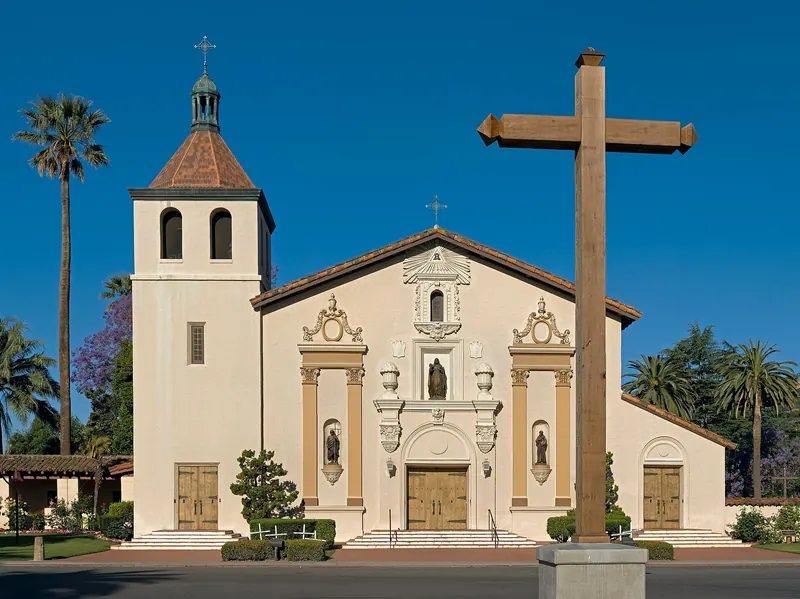 The white facade and cross of Mission Santa Clara de Asis at Santa Clara University