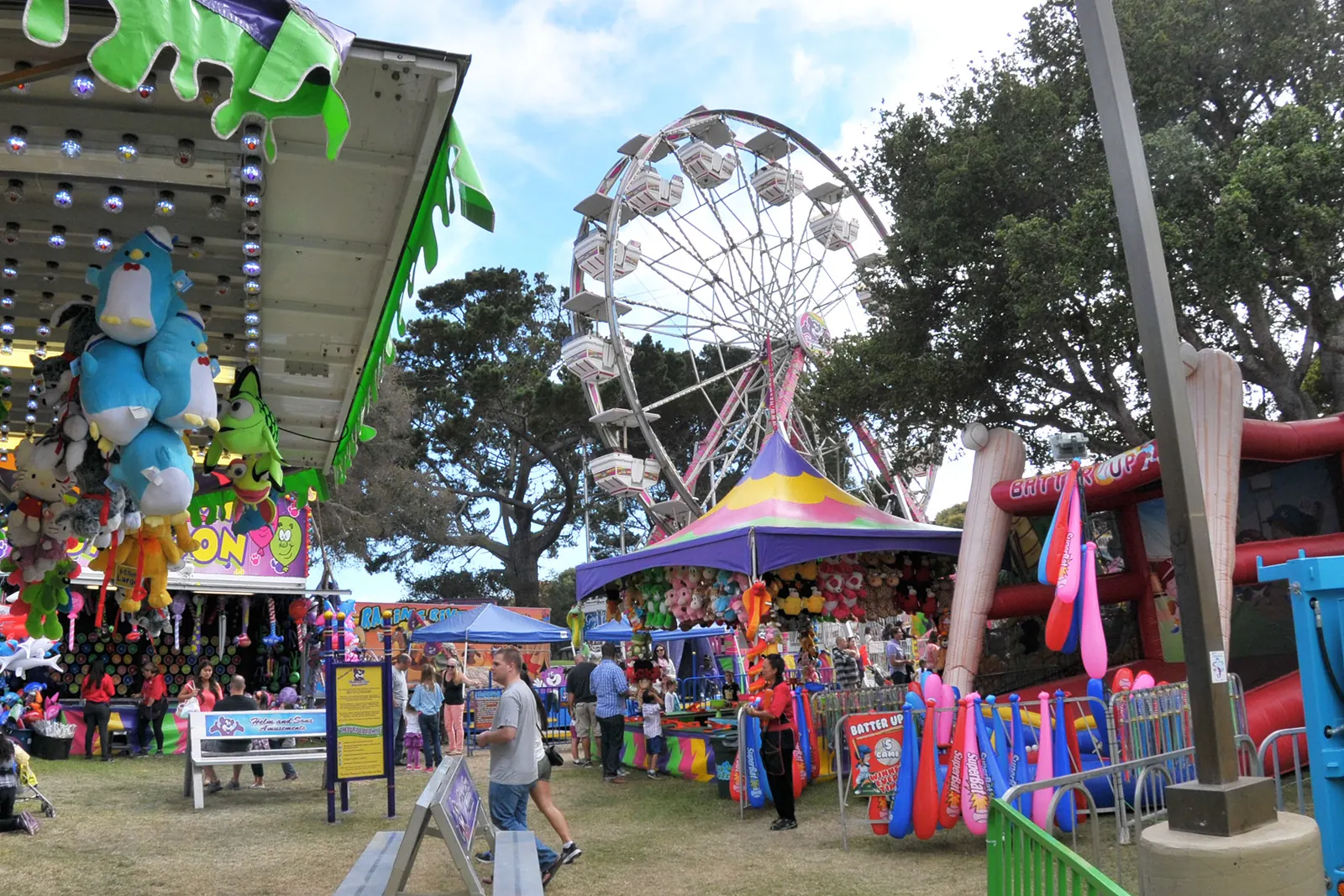 A Ferris wheel and midway rides at the Monterey County Fair