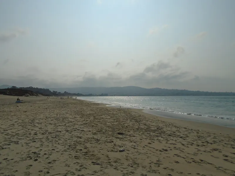 The wide sandy shoreline of Monterey State Beach on Monterey Bay