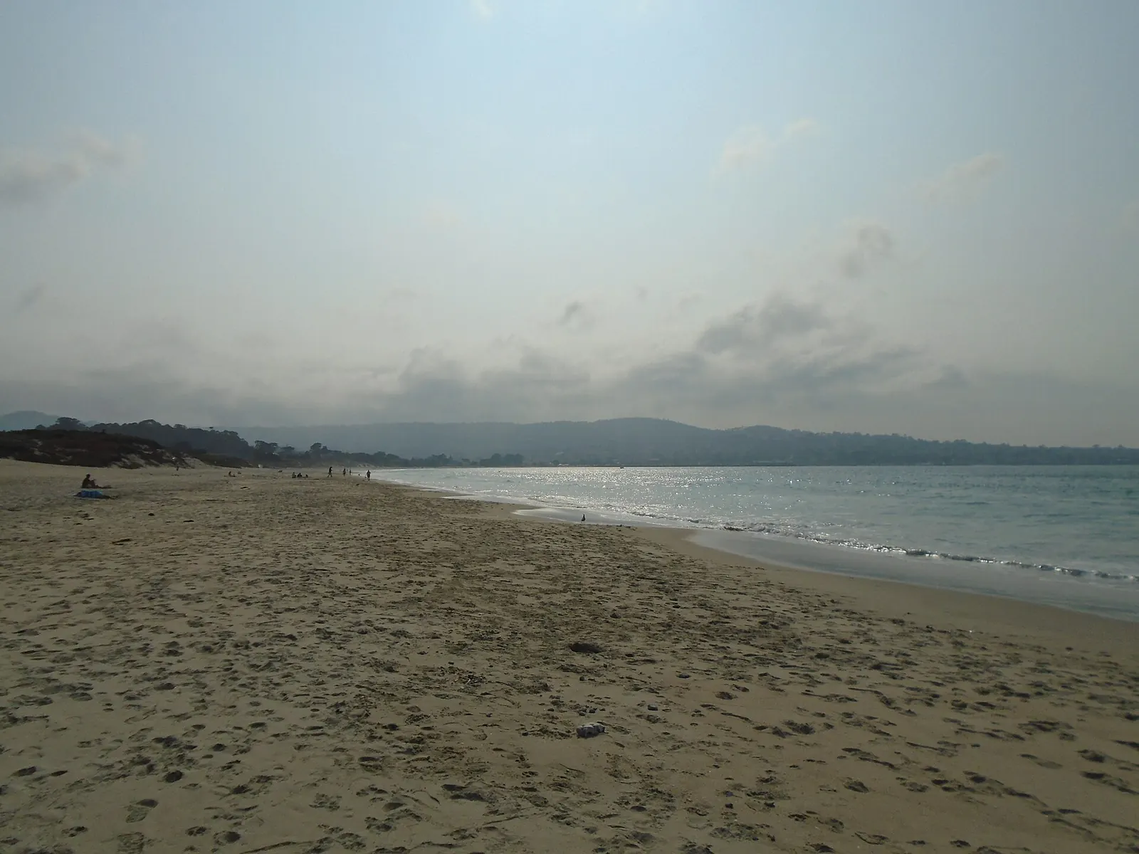 The wide sandy shoreline of Monterey State Beach on Monterey Bay